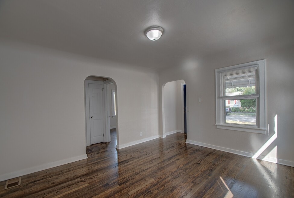 Bright living room with dark hardwood floors